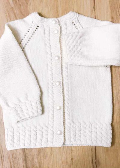 Kremowy sweter niemowlęcy dla dziewczynki